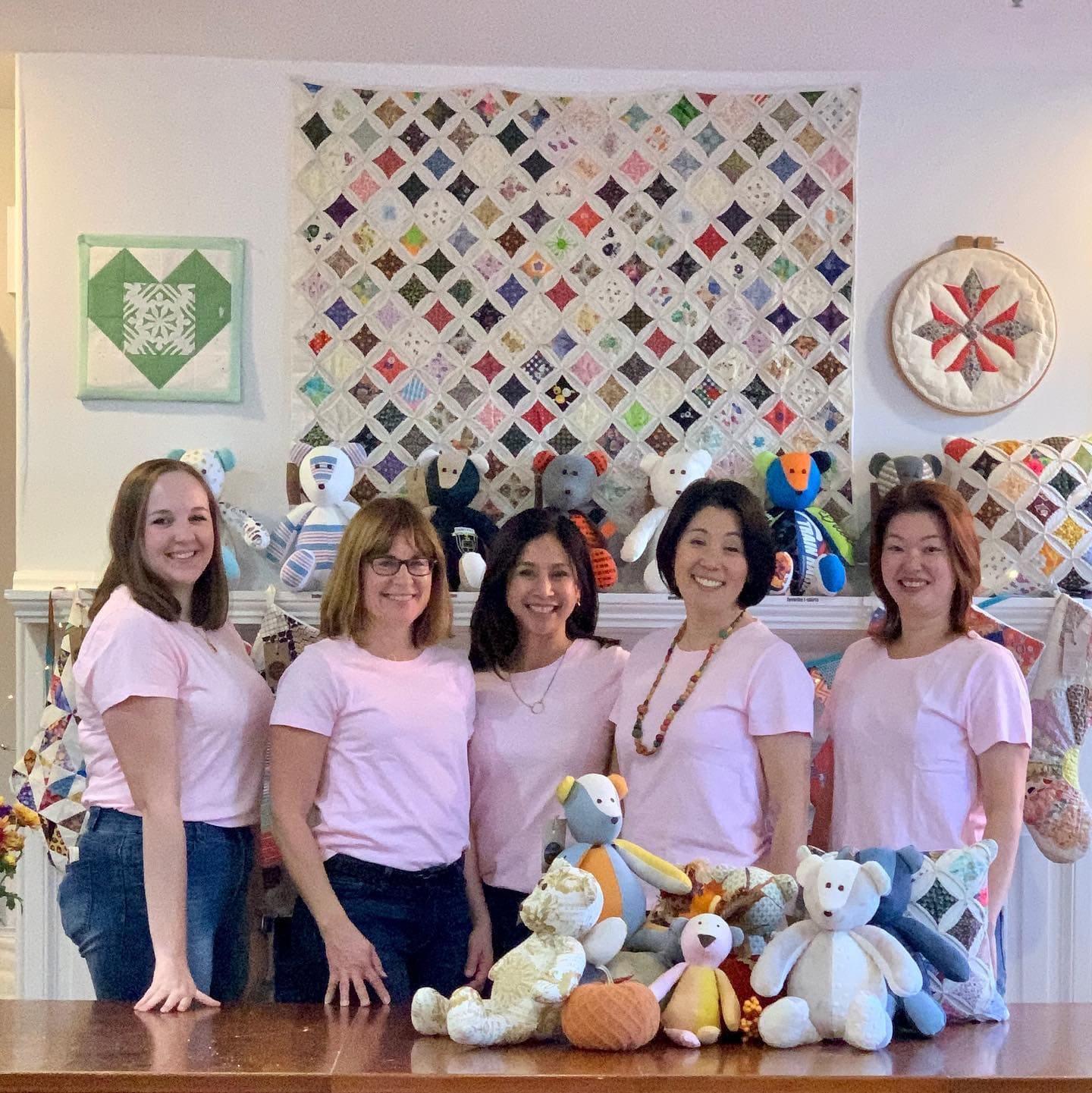 Team members with handmade bears