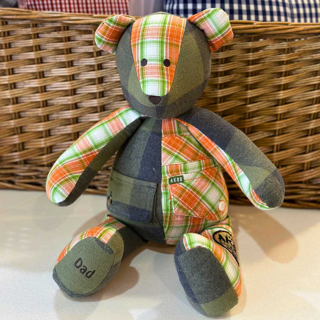 Plaid bear made from shirts with pockets, Dad foot.