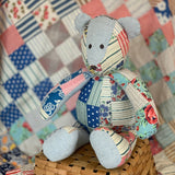 1940s patchwork bear sitting on basket
