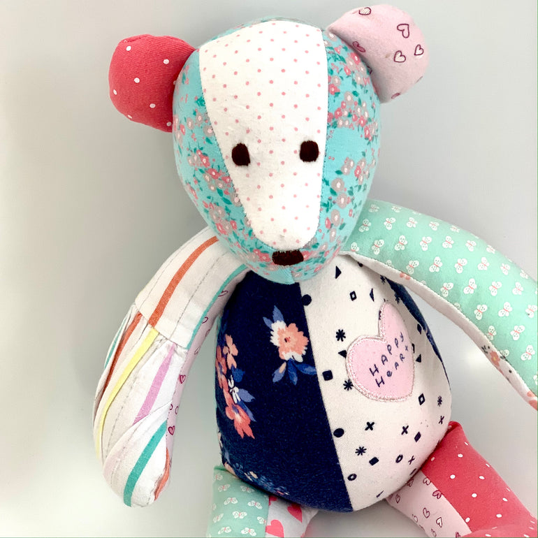memory bear made with baby onesies to remember those precious baby days