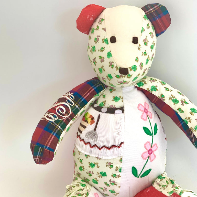 A memory bear made with vintage baby clothes makes the perfect keepsake to save childhood memories