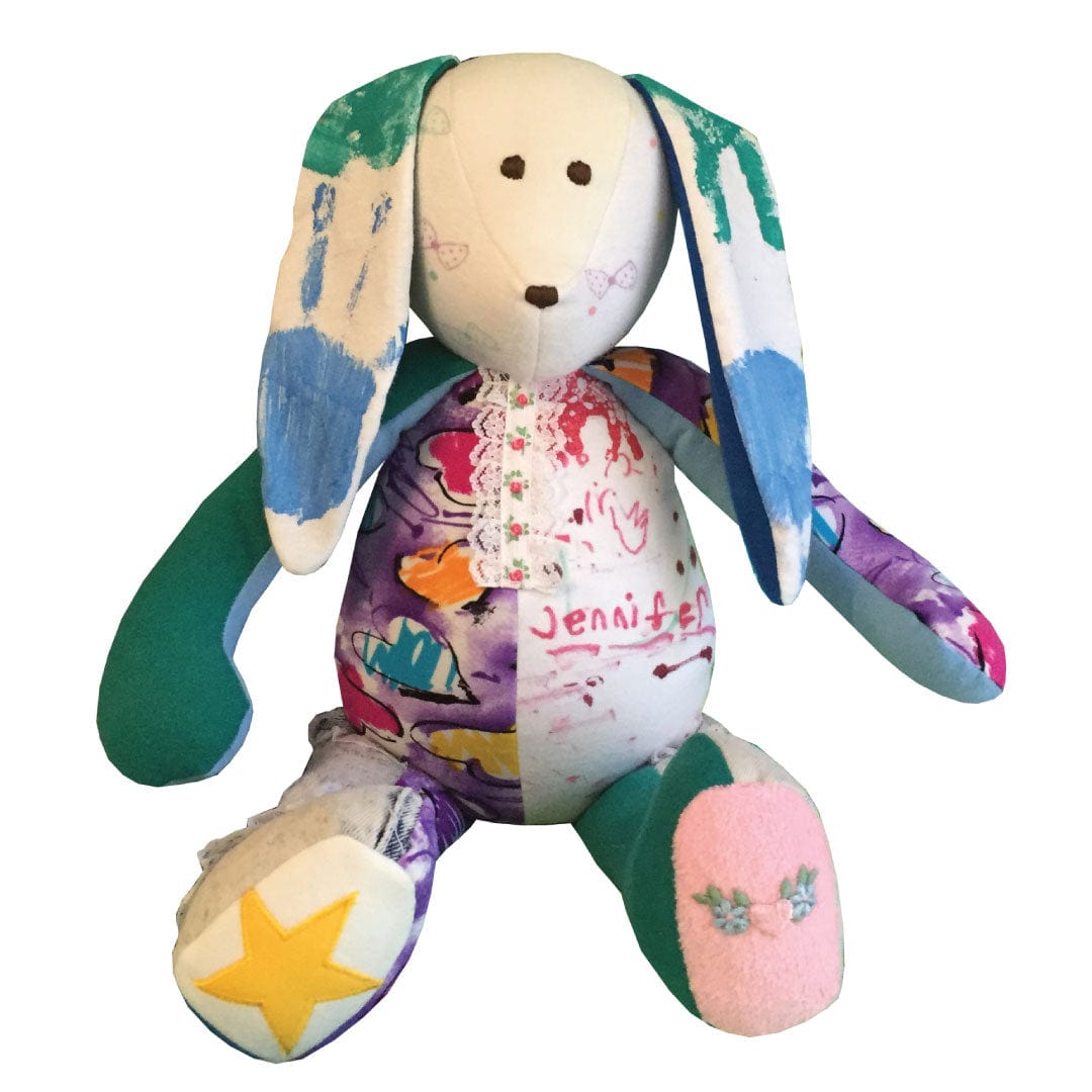 Bunny plush with colorful handprints and Jennifer's name.