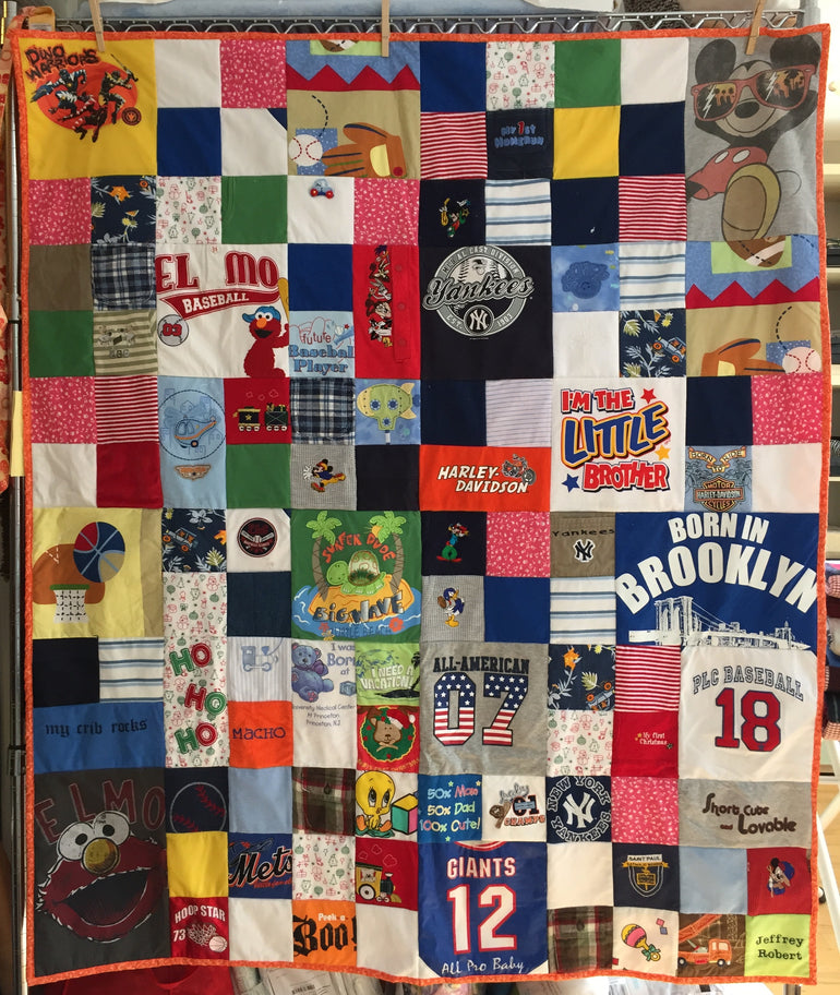 Memory Quilt made from favorite clothes with varied size blocks
