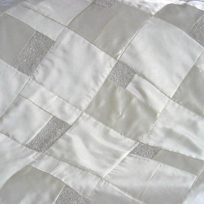 white patchwork with beaded accents