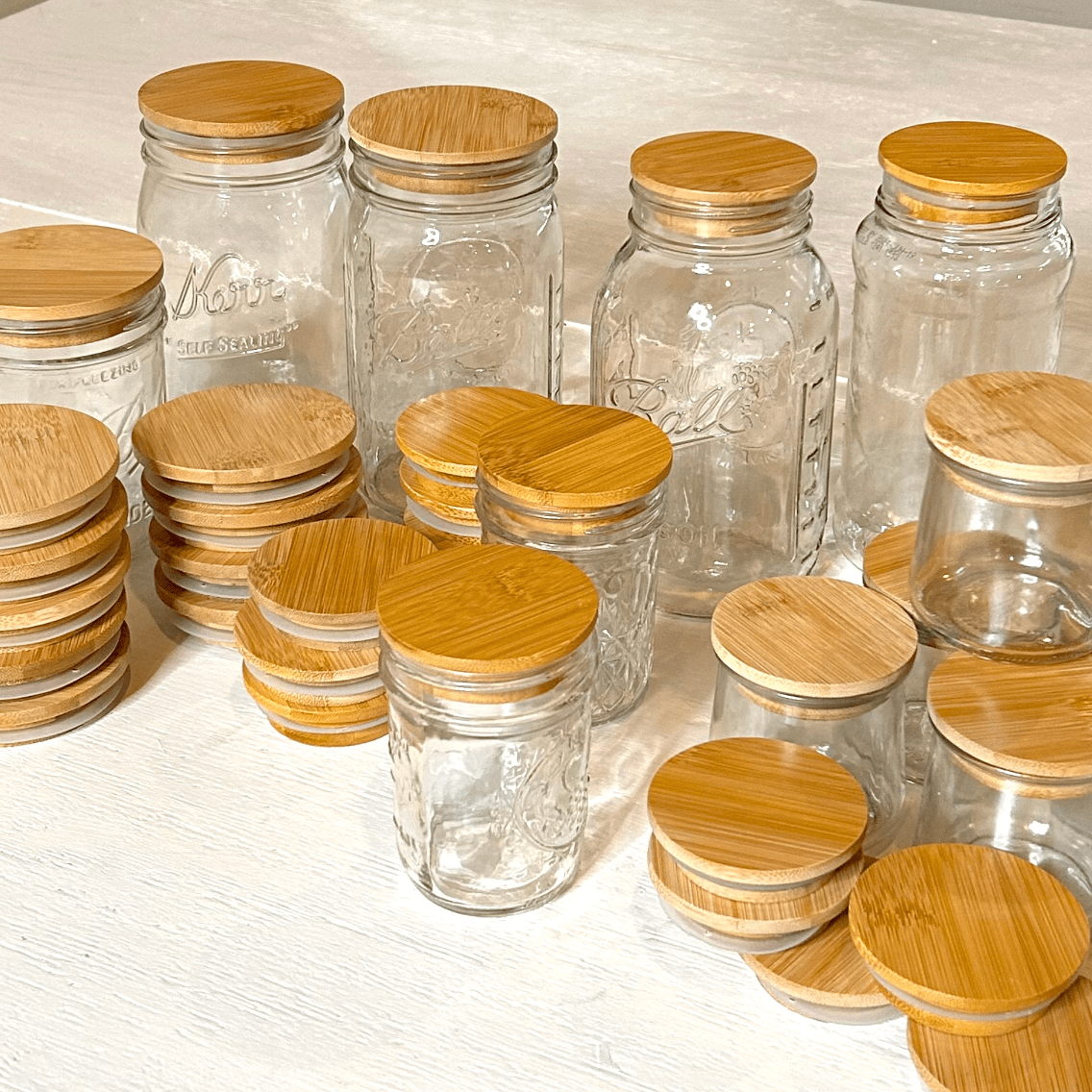 Glass jars with bamboo lids.