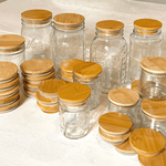 Glass jars with bamboo lids.