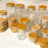 Glass jars with bamboo lids.