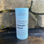 Deodorant stick on stone background.