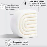 White, arched shampoo bar.