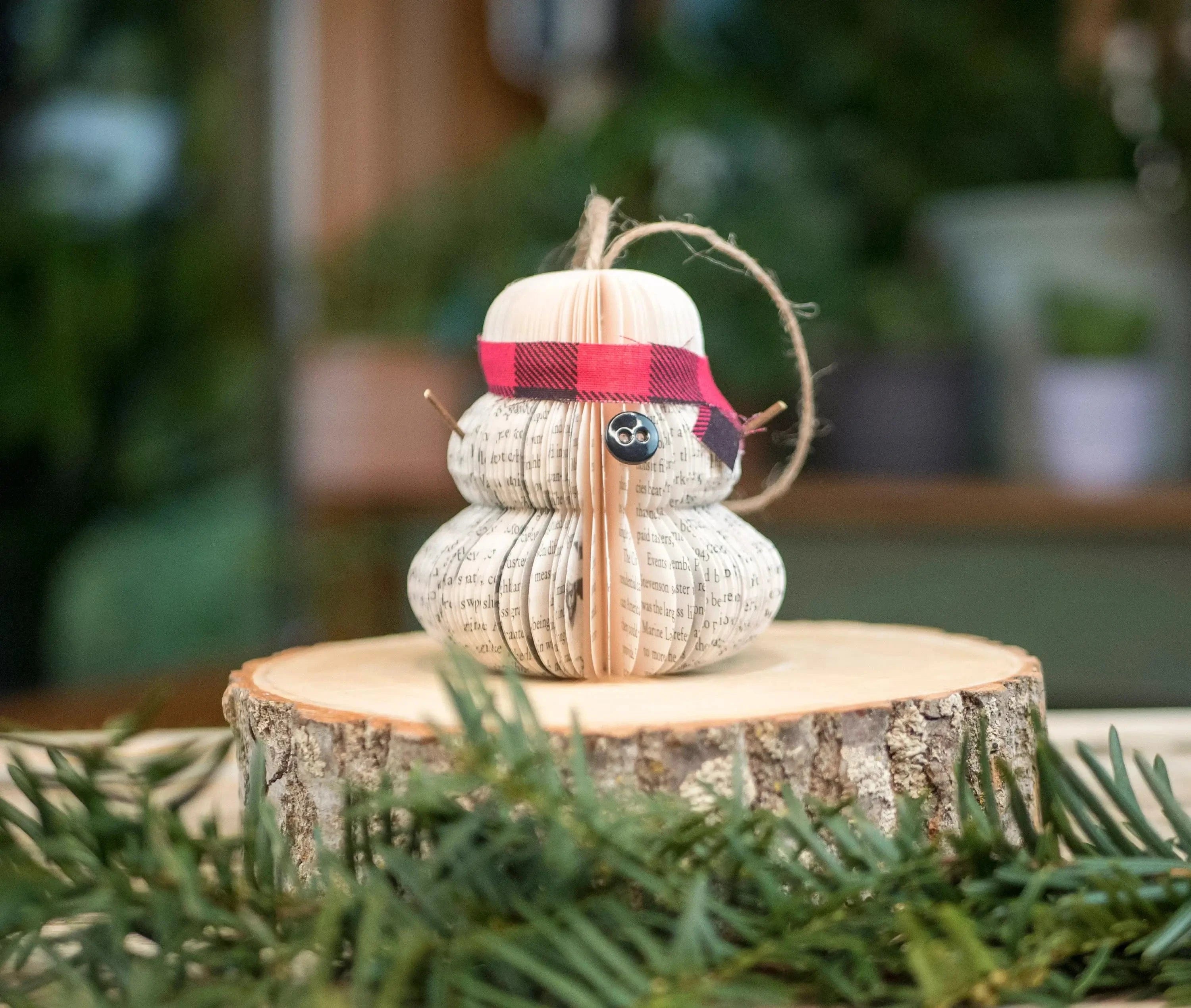 Snowman ornament made of book pages.