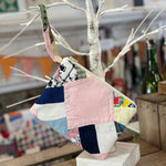 Patchwork clutch purse with handle.