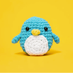 Crocheted blue penguin on yellow background - ScreenShot 2023-06-16