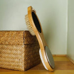 Wooden foot brush and basket.