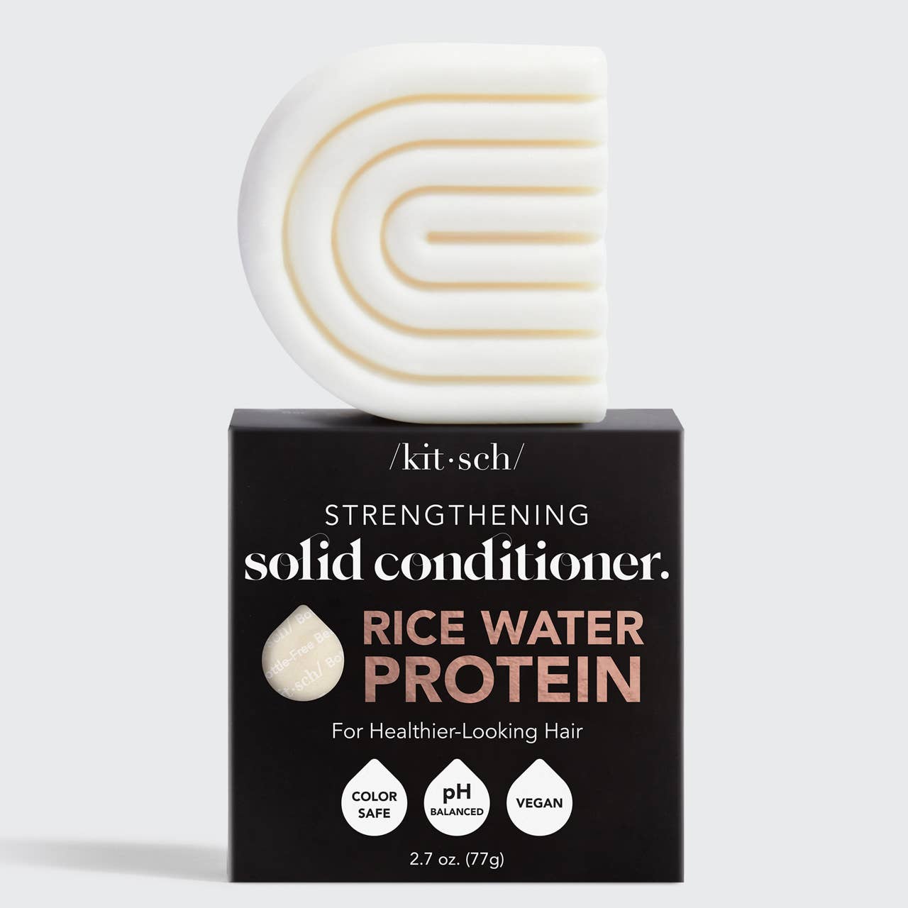 Solid conditioner bar on a product box.