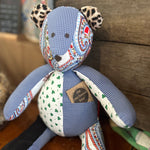 Memory bear with patchwork design and pocket