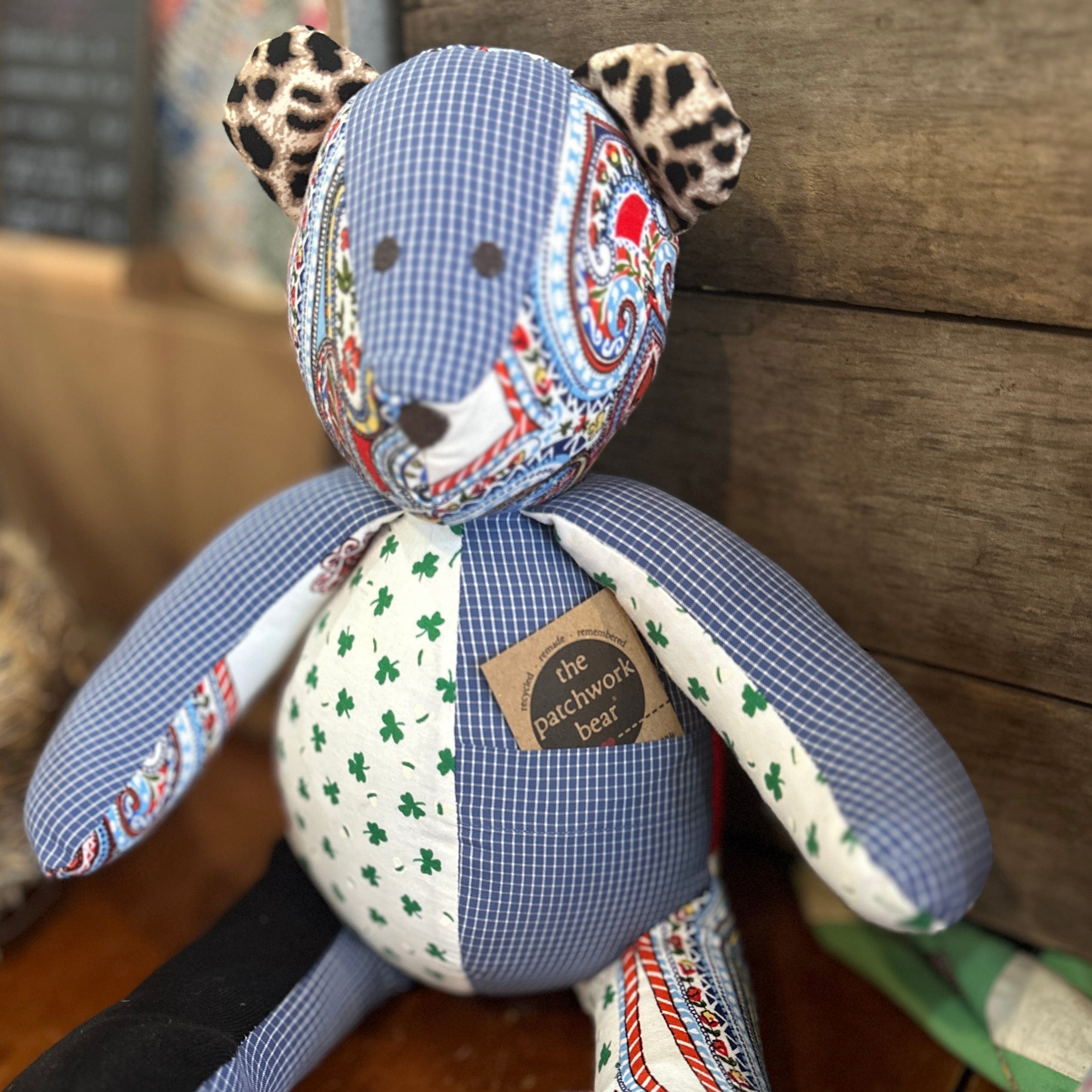 Memory bear with patchwork design and pocket