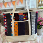 Tote bag with colorful patchwork design made from socks