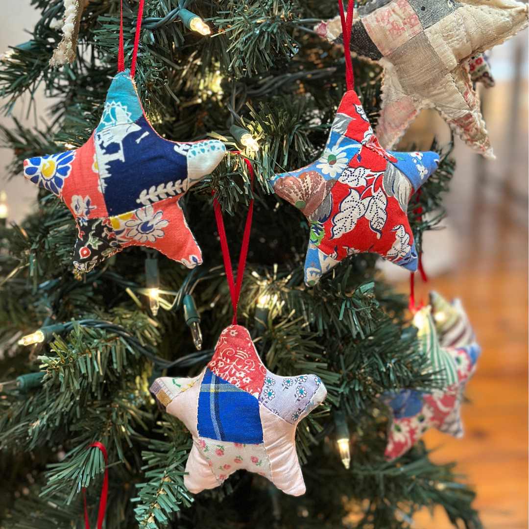 Vintage quilt star ornaments on Christmas tree