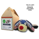 Dog stuffed animal next to craft box.