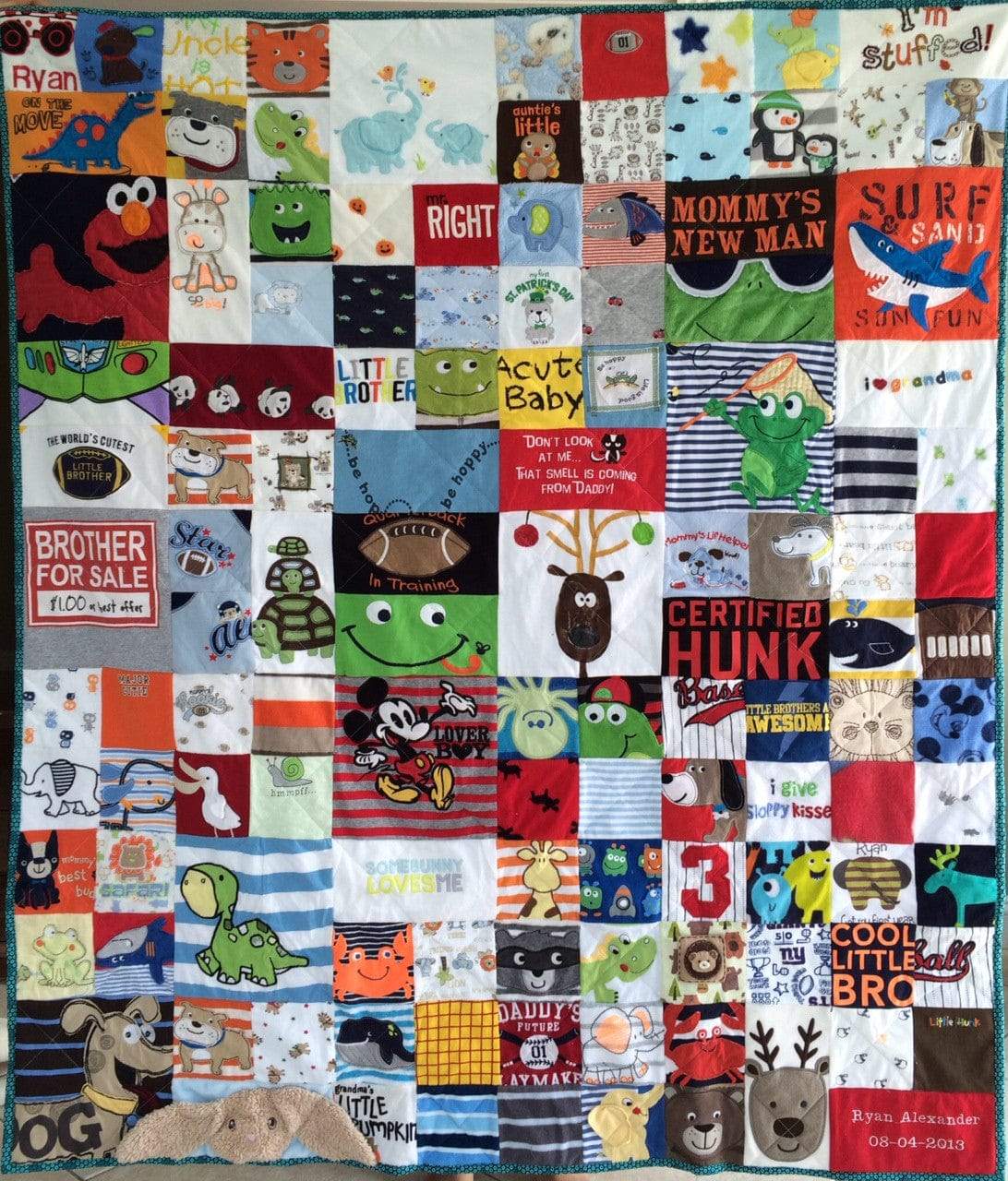 Memory quilt made from baby clothes, 2015