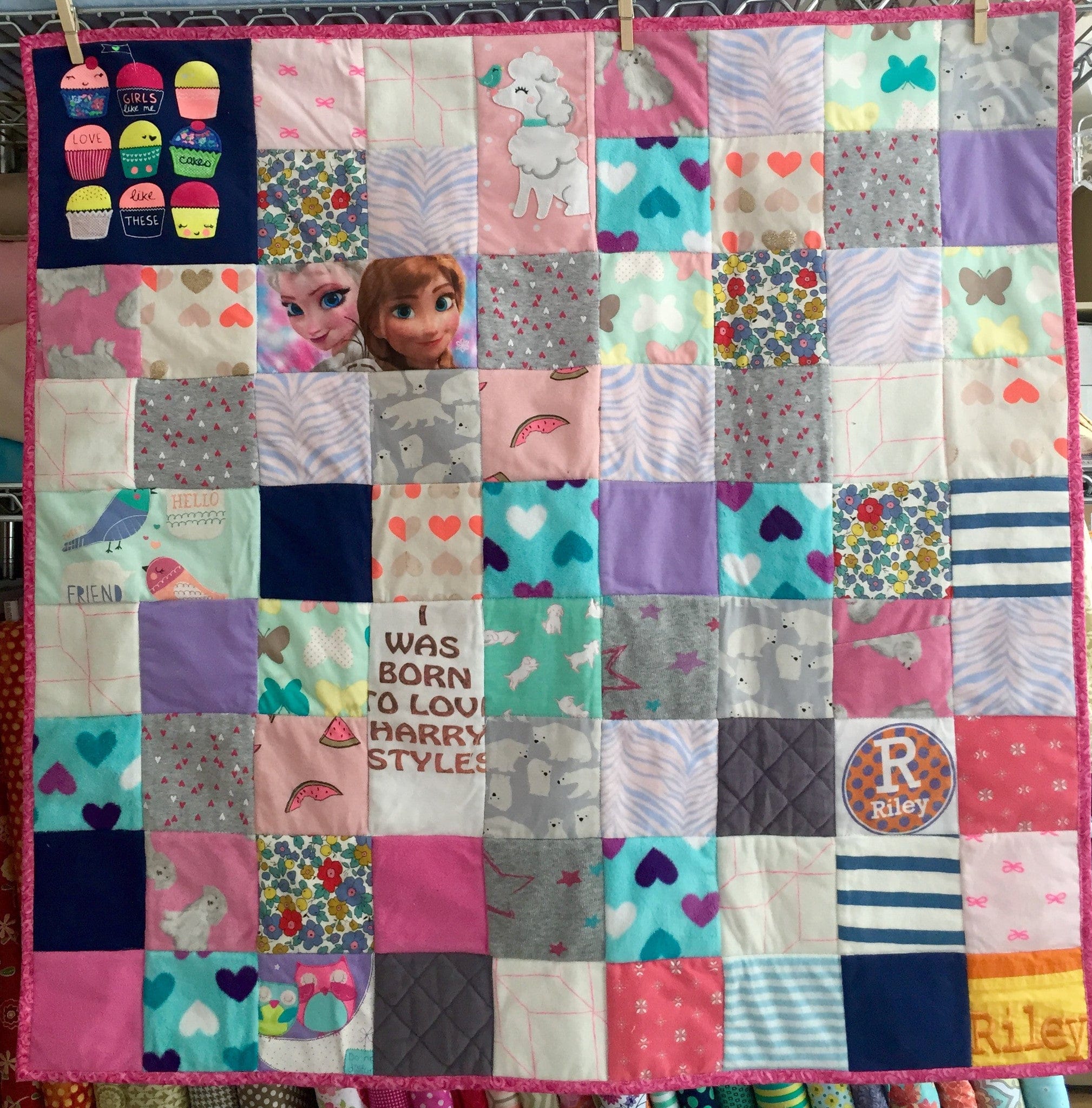 Girl's handmade patchwork quilt with random patterns and designs