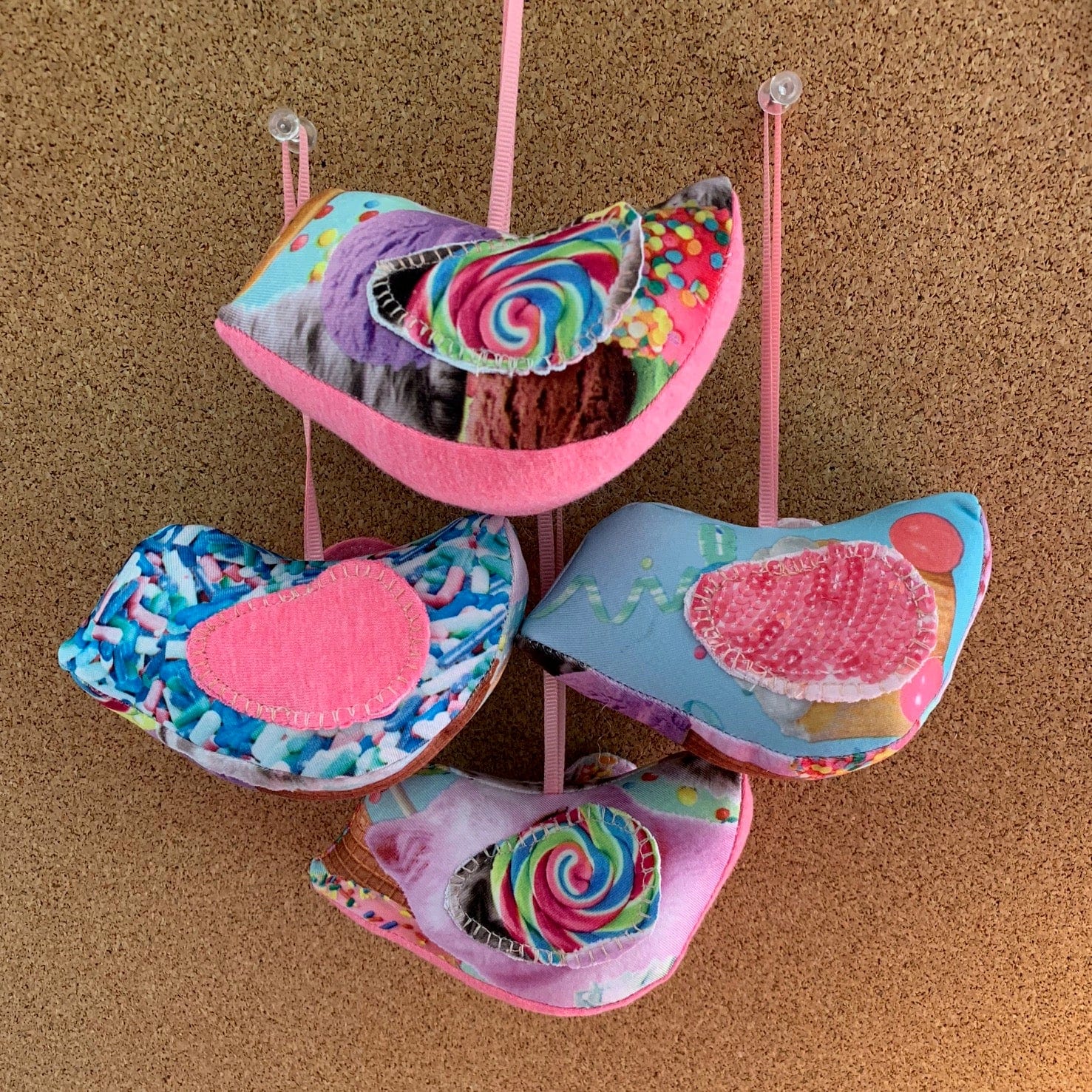 Colorful fabric bird ornaments hanging