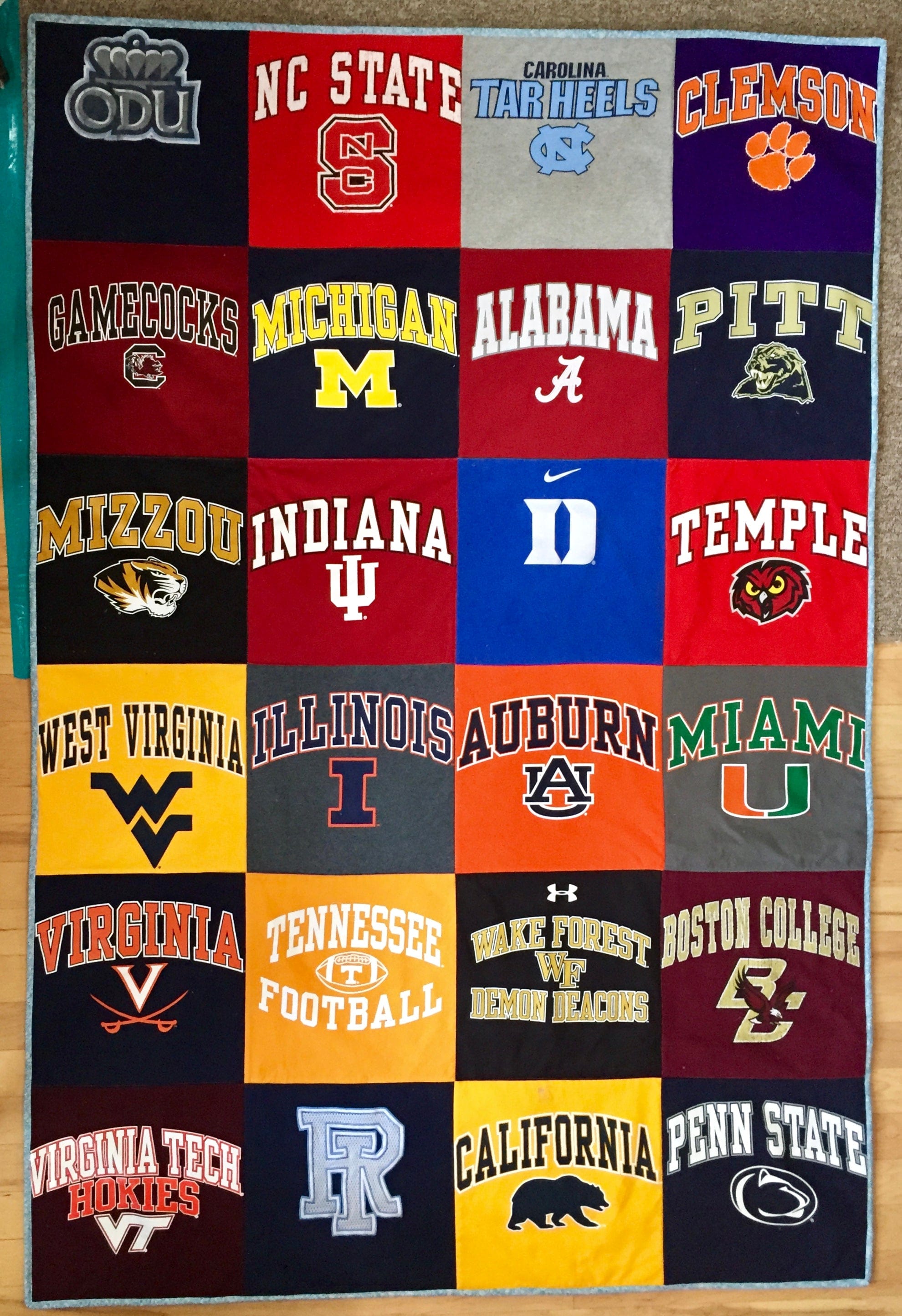 Quilt made of college team shirts.