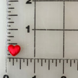 Red heart next to ruler.