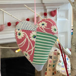 Vintage patchwork heart quilt ornament, pink and green