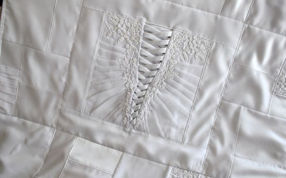 wedding dress quilt using back of wedding dress as focal point