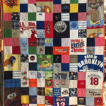 Memory Quilt made from favorite clothes with varied size blocks