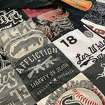 T-shirt quilt made from various band & sports shirts.