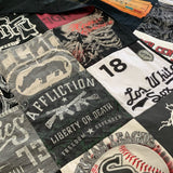 T-shirt quilt made from various band & sports shirts.